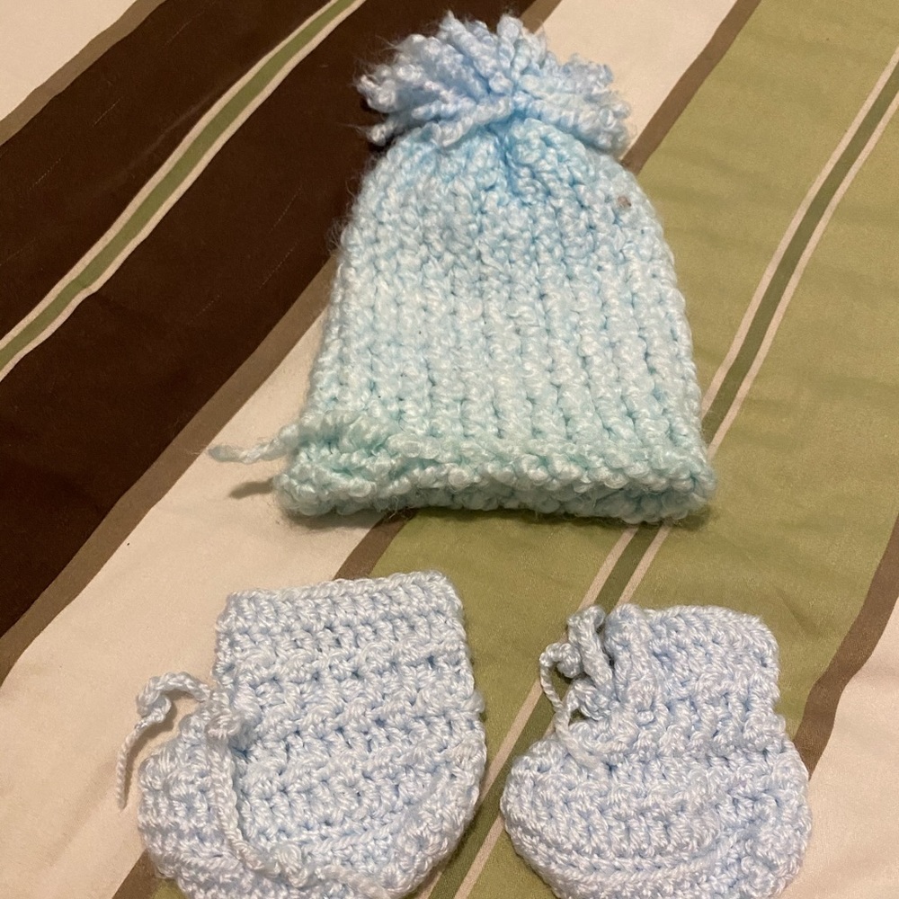 Hand knitted gloves and hat